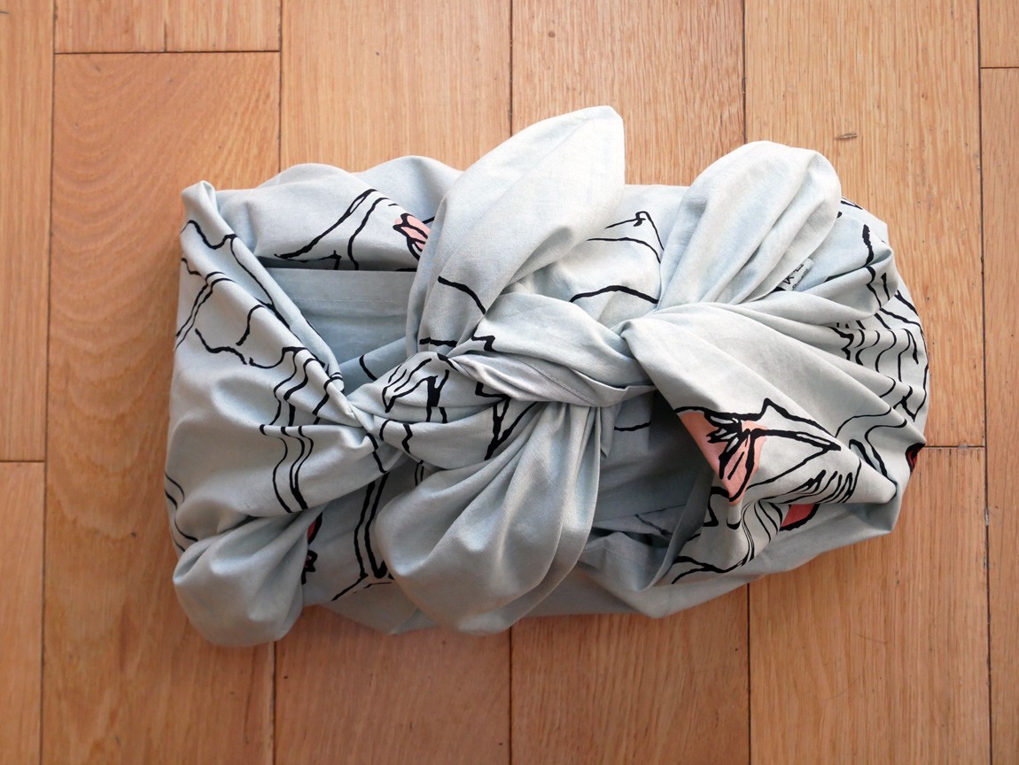 This year, give yourself a break from fighting with sellotape and paper that won’t cut or fold evenly. Instead, make an eco friendly, beautiful, simple and quick Furoshiki wrap. A beautiful wrap can be a gift in itself.